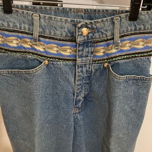Vintage early 1990s MCM medium to light wash denim jeans with logo plaque A 6642